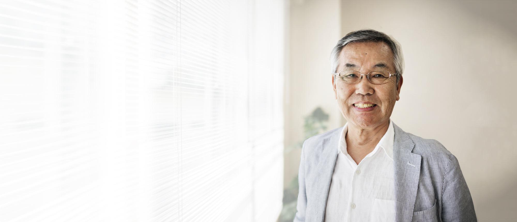 Man standing by window